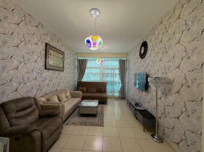 Luxury 2 bedroom next to beach with swimming pool gym and kids play area